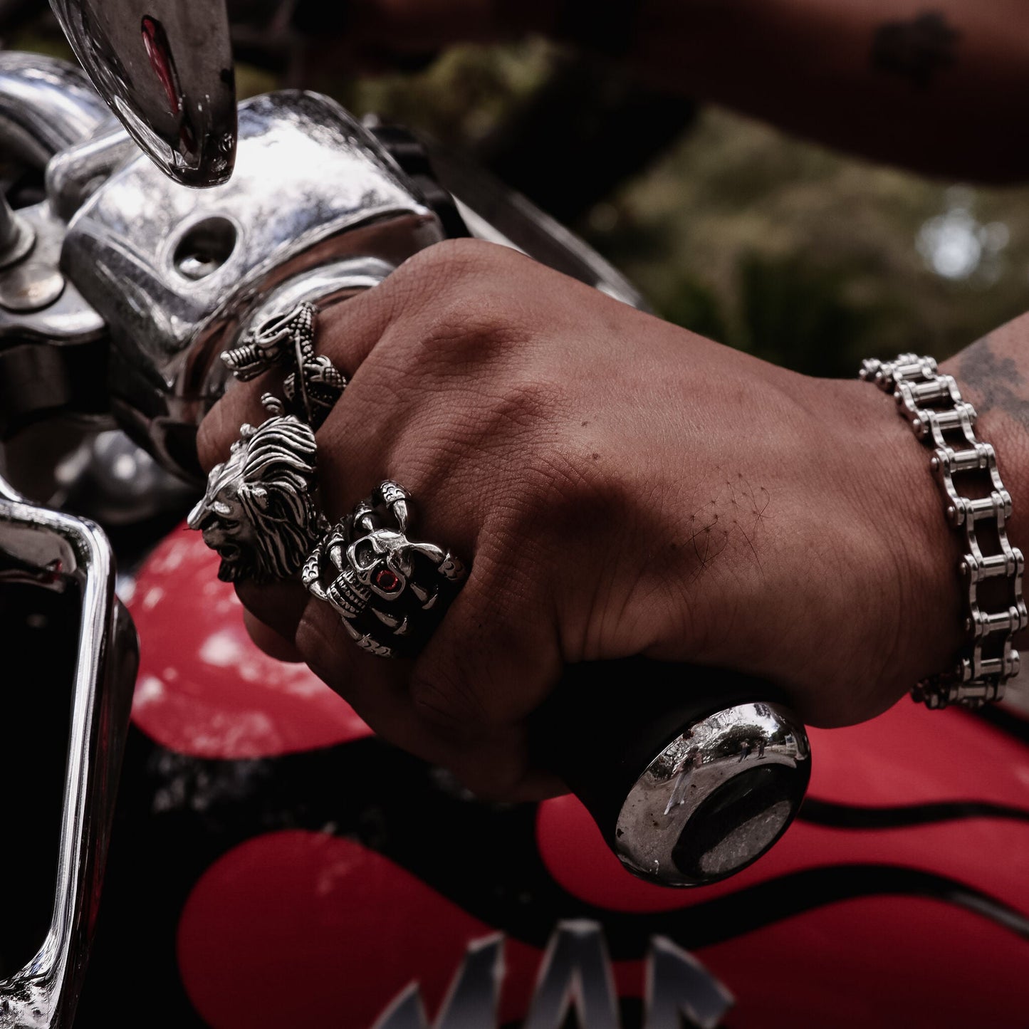 Stainless Steel Dragon Claws Holding Red CZ Eyed Skull Ring